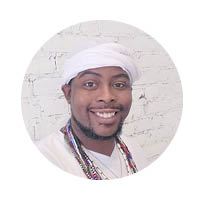 male taking a selfie with white background, smiling.