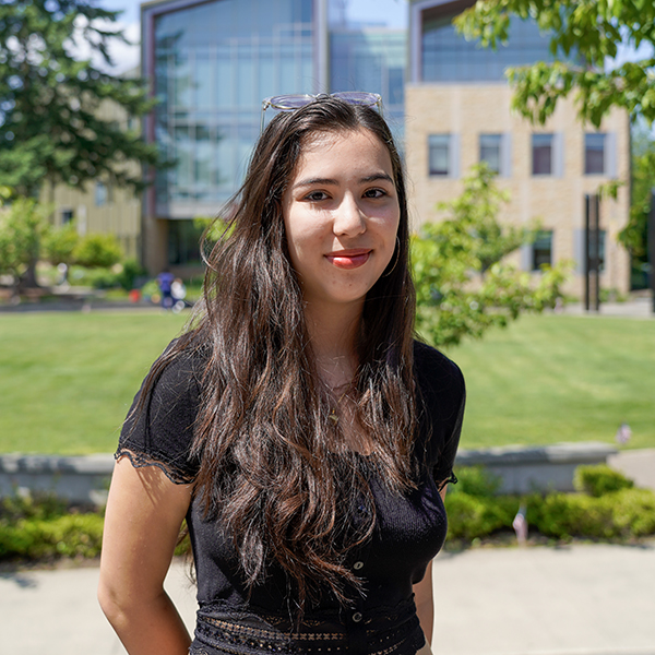 grad wearing black shirt