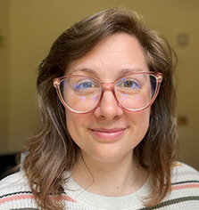 Photo of a woman in glasses. 